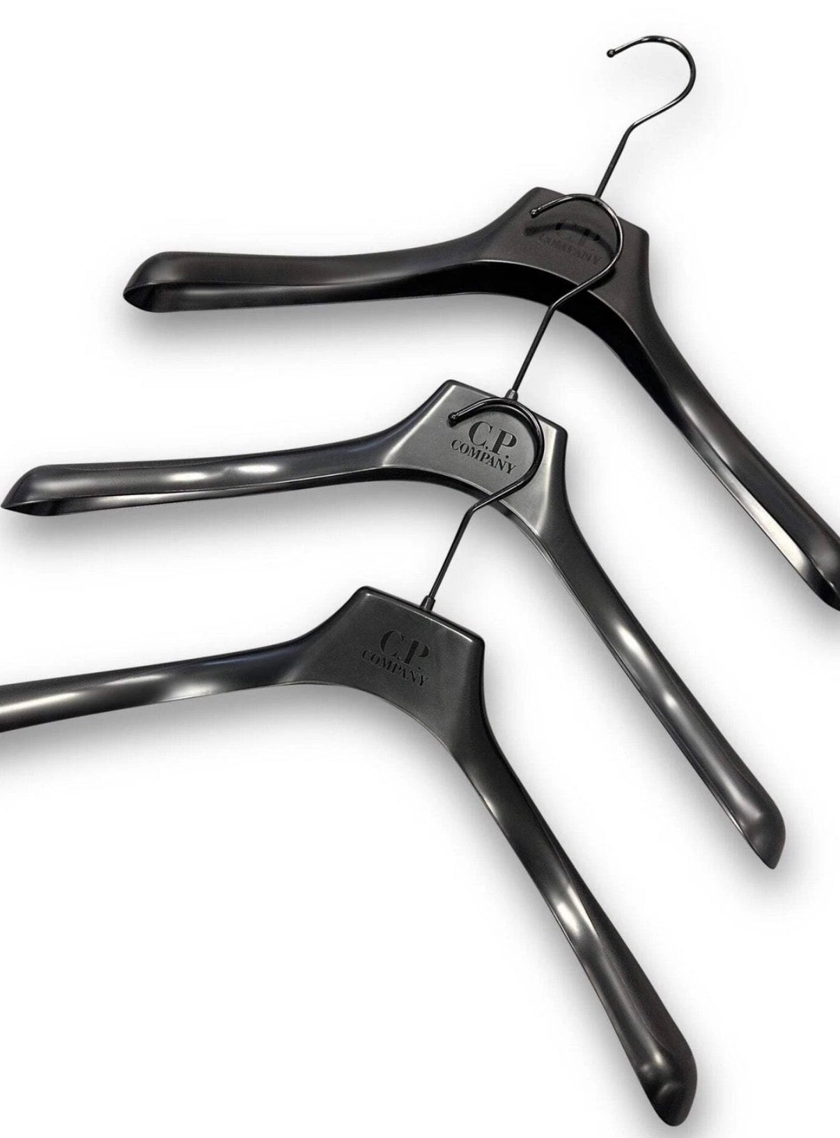 C.P. COMPANY PLASTIC COAT HANGERS BLACK