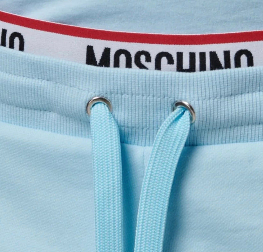 MOSCHINO TAPE TRACKSUIT JOGGING BOTTOMS BABY BLUE