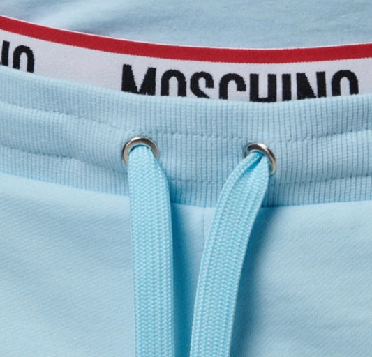 MOSCHINO TAPE TRACKSUIT JOGGING BOTTOMS - BABY BLUE